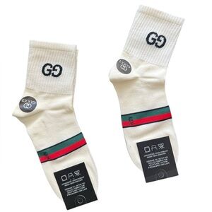 NWT 2 Pair Gucci Outlet Men's Cream 
With classic Gucci Striped Socks